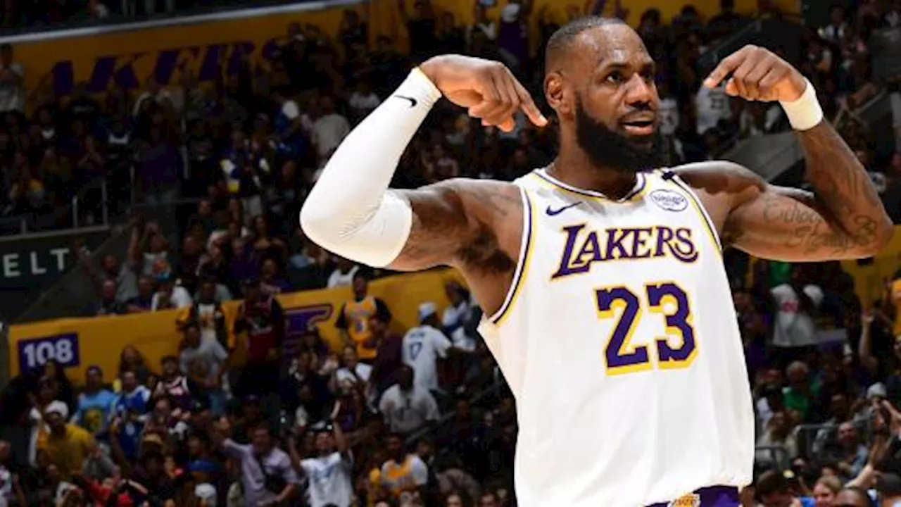 LeBron James records triple-double, Davis scores 31 in Lakers' 131-127 win over Kings