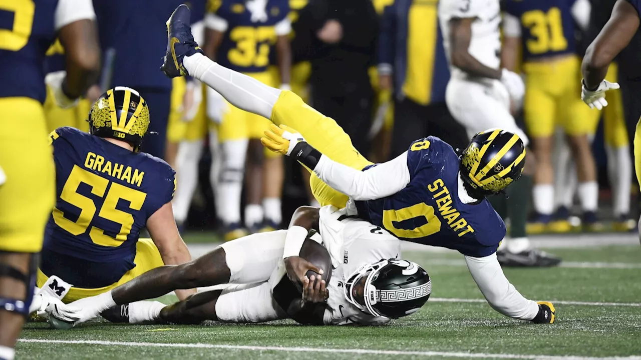 Michigan and Michigan State throw punches, push and shove after Wolverines beat rival Spartans