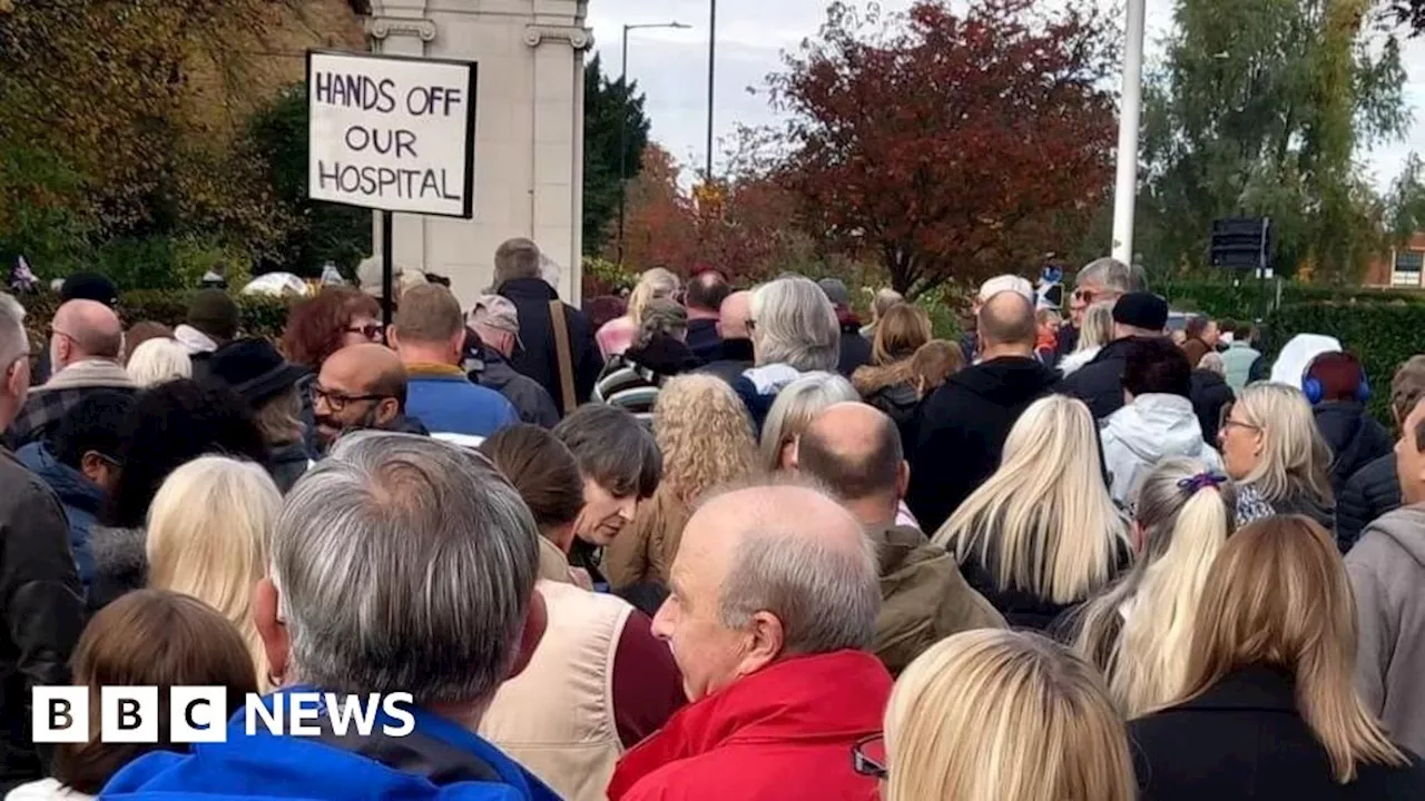 Rugby campaigners march against hospital ward closure