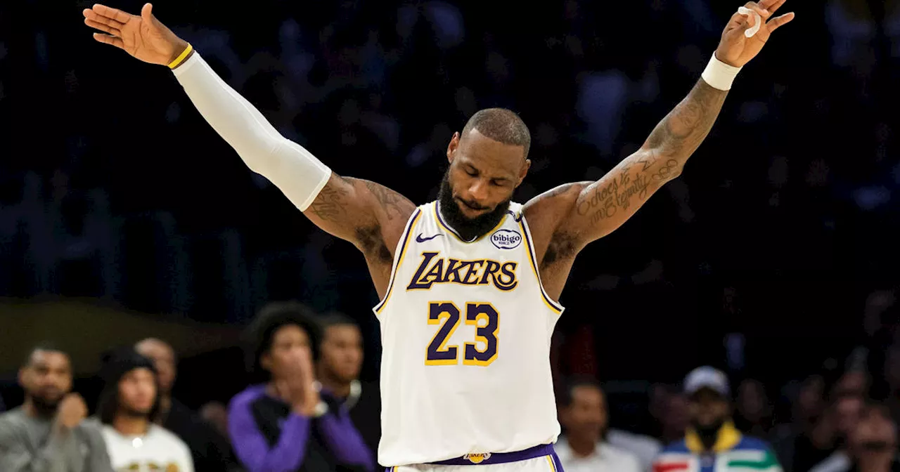 LeBron James records triple-double, Davis scores 31 in Lakers' 131-127 win over Kings