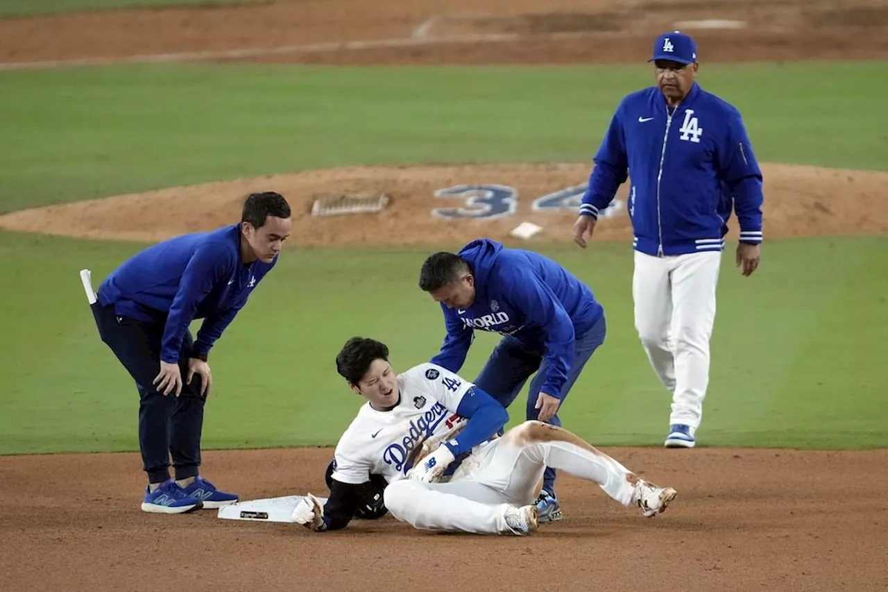 Shohei Ohtani partly dislocates left shoulder during World Series Game 2, status uncertain