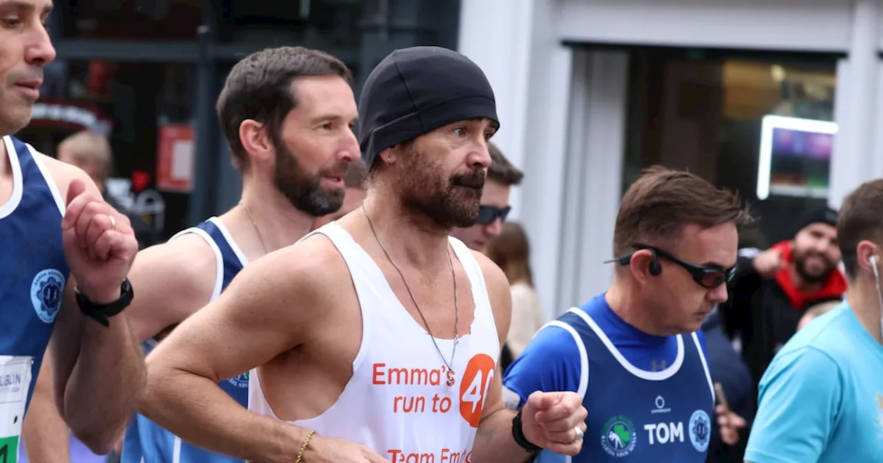 Colin Farrell spotted among participants as 20,000 runners take to the streets for the Dublin Marathon