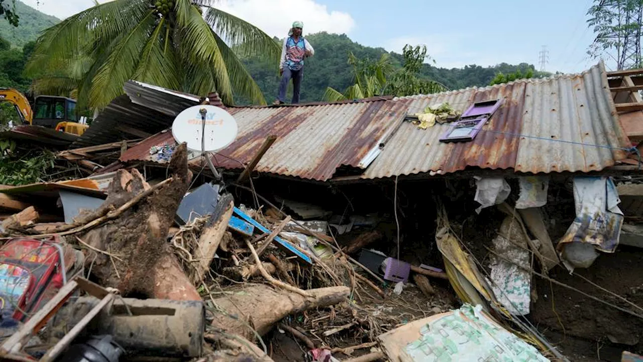 Philippines' Storm Trami death toll hits 100 as rescuers seek missing