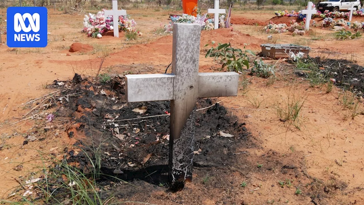 Graves burnt in cemetery after bushfire at Fitzroy Crossing