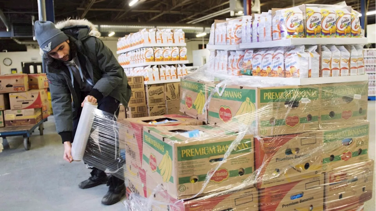 Monthly food bank use soars to record 2 million, driven by cost of groceries, housing