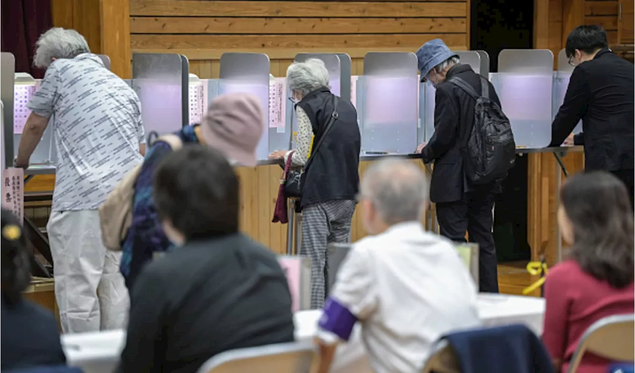 Japan's Nikkei 225 climbs, yen drops amid political uncertainty as ruling coalition loses majority