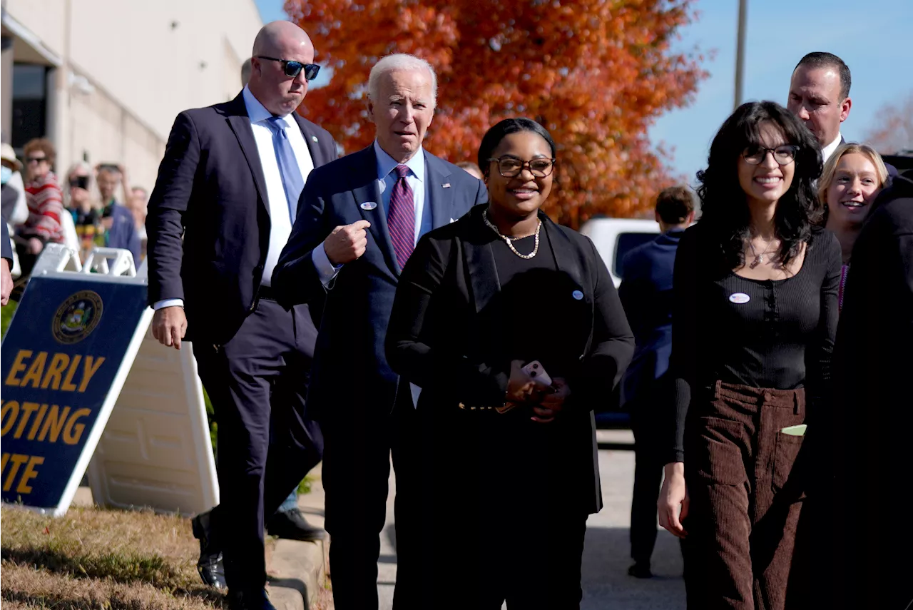 President Joe Biden waits in line to vote early in home state of Delaware