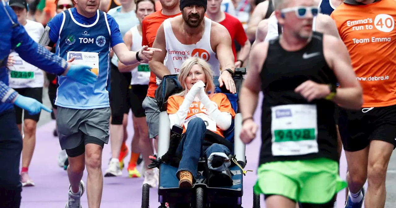 Colin Farrell emotional as he completes marathon - pushing pal over finish line