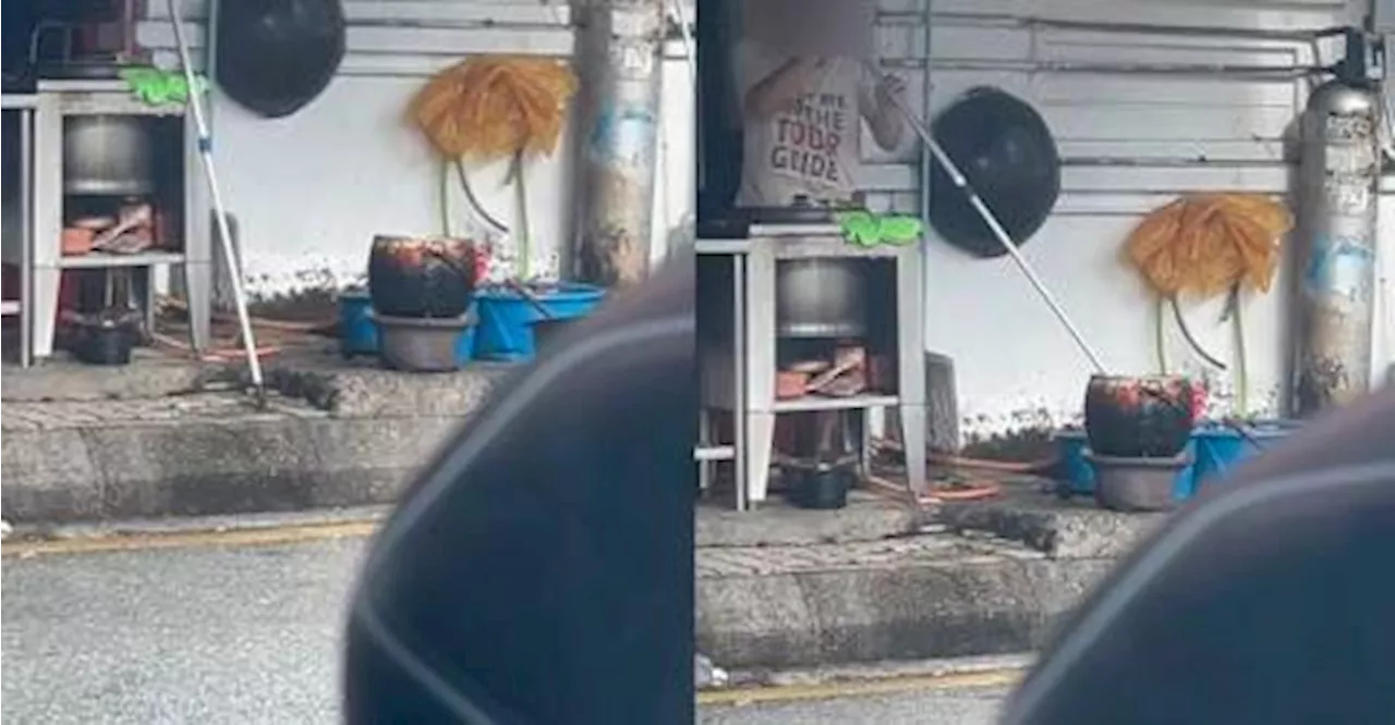 Food stall operator caught stirring pot with dirty paint roller handle