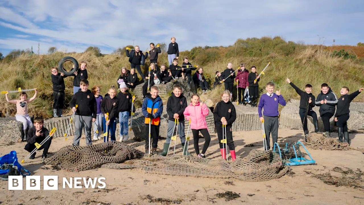 Children visit Northumberland beach for the first time