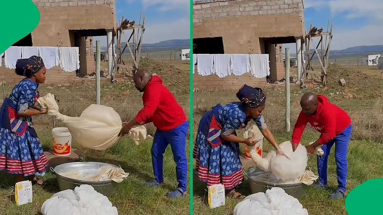 African Couple’s Sweet Teamwork Washing Bed Sheets Melts Mzansi’s Hearts in Viral Video