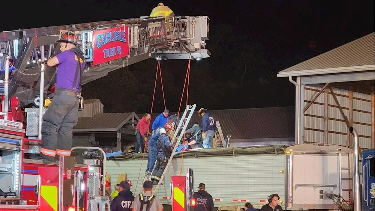 Firefighters rescue teen, adult trapped up to shoulders in grain in Cumberland County