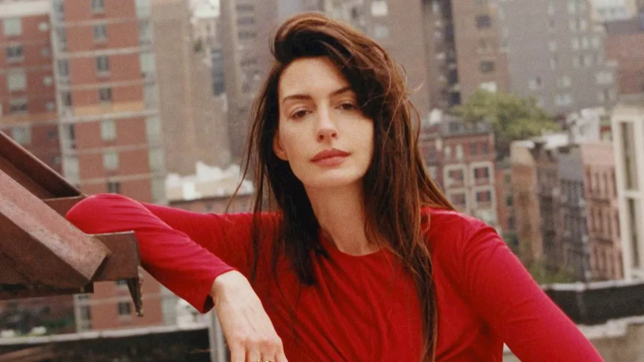 Anne Hathaway talks embracing her 'femme fatale' side at 41 as glamorous star graces Vogue France...