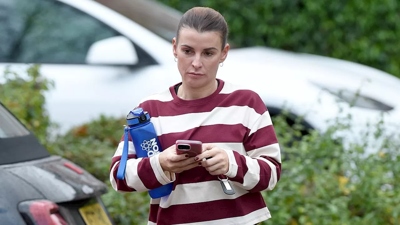 Coleen Rooney dresses down in sporty activewear as she prepares for a workout in Cheshire