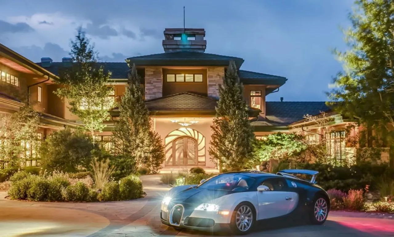 Retired race car driver re-lists Evergreen mansion for $19 million after $6M price drop