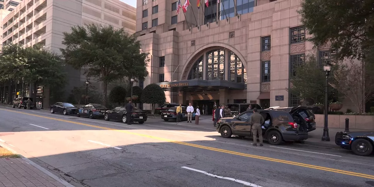 Suspect had multiple weapons, fired 15+ rounds in Midtown hotel standoff, APD officer hurt