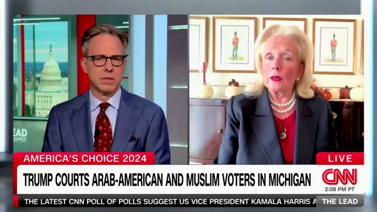 Rep. Dingell tells a skeptical Tapper he might 'have to visit' her in an internment camp if Trump wins