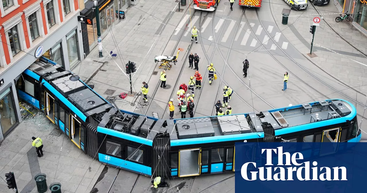 Zombie protesters and a derailed tram: photos of the day