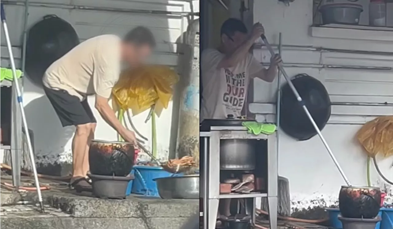 [Watch] Sri Petaling Hawker Caught Using Pole To Mix Chicken Feet For Wonton Noodles