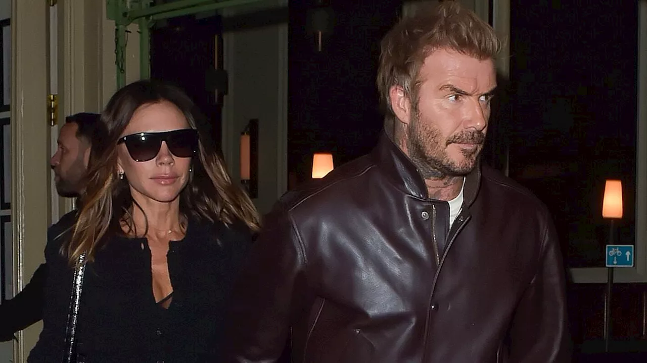 Victoria and David Beckham hold hands while leaving swanky restaurant