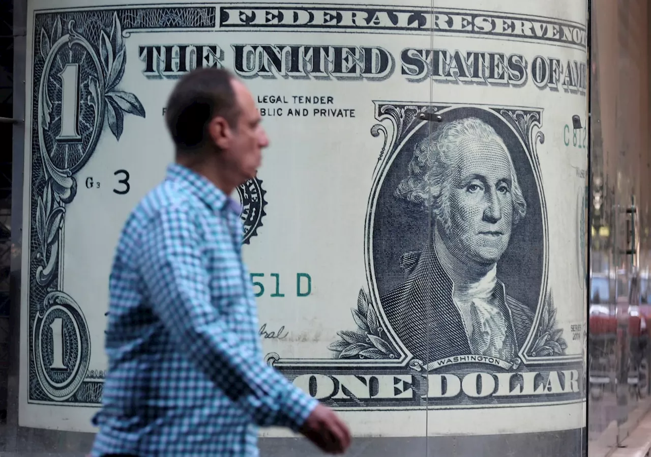 Traders Gauge Dollar's Decline Amid Global Rate Cuts