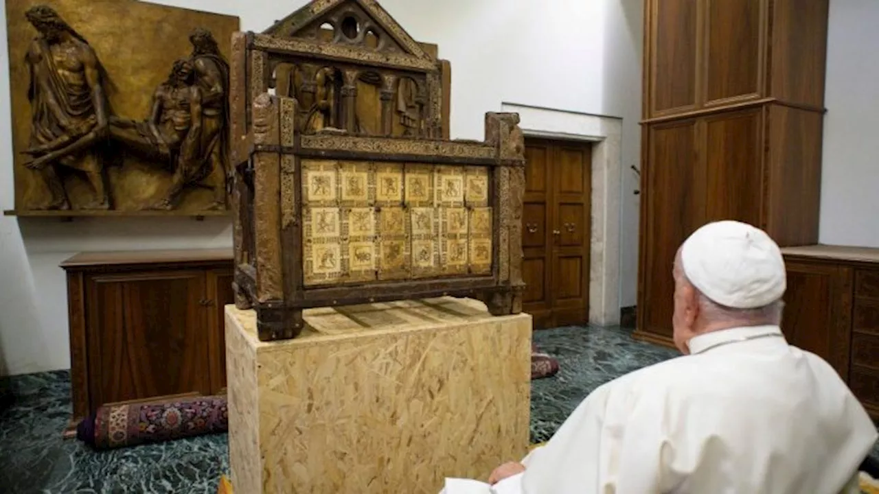 Pope views a relic of the Chair of Saint Peter