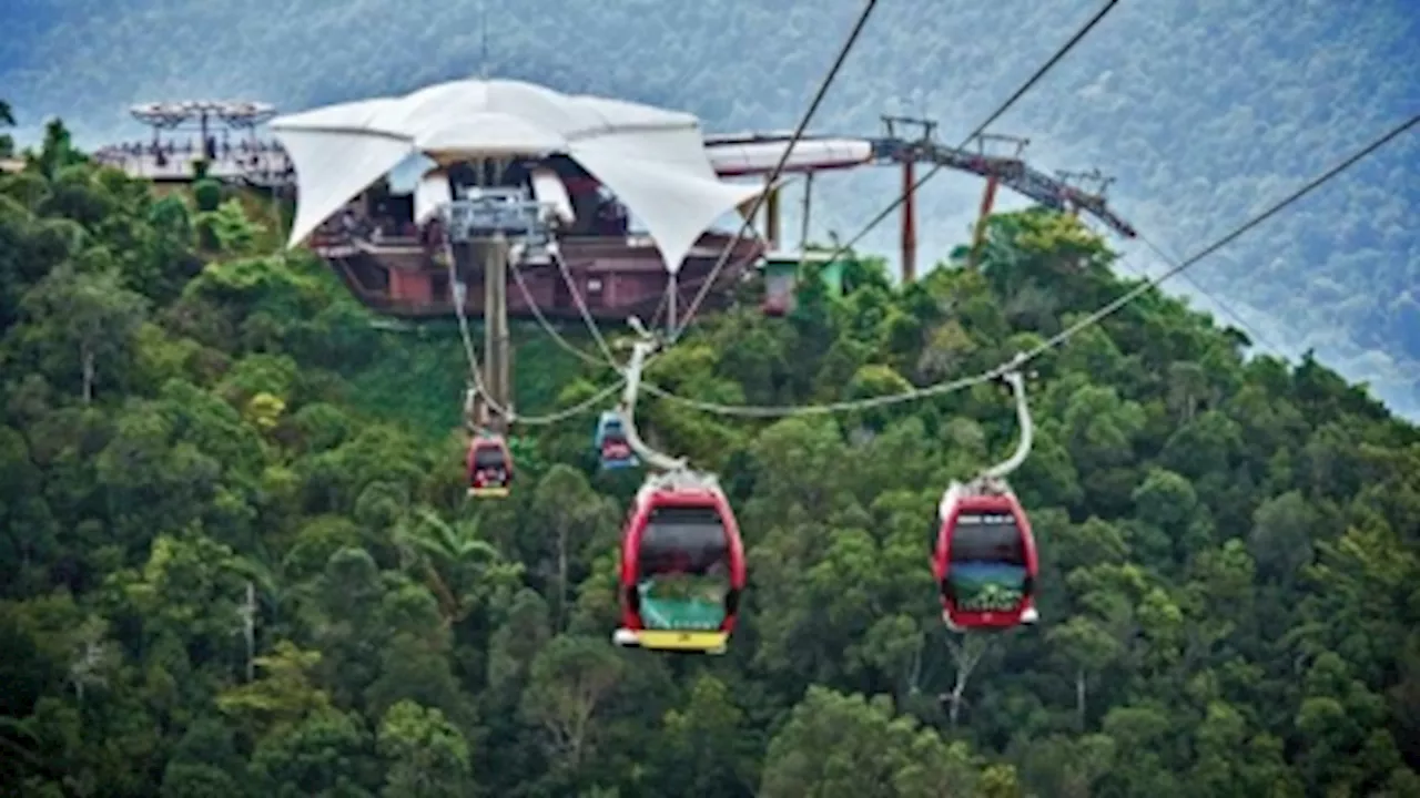 Search ongoing for Langkawi cable car technician who fell 50m during maintenance job; condition unknown