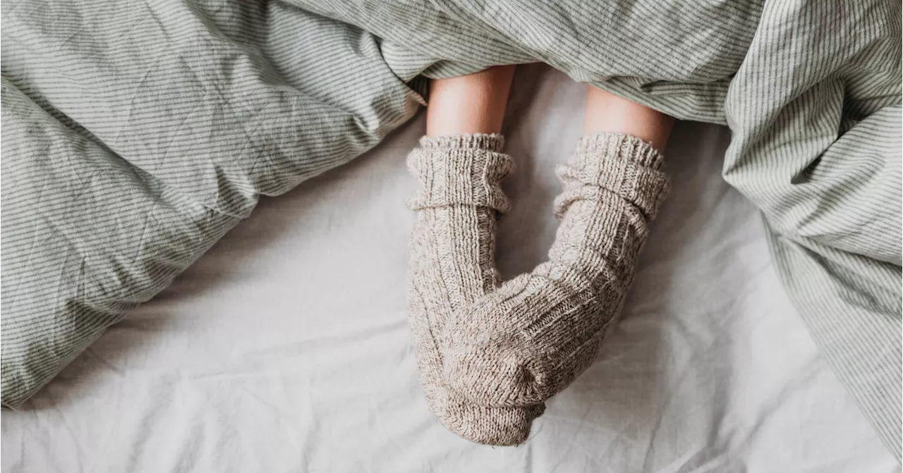 Is Wearing Socks to Bed OK? Experts Explain