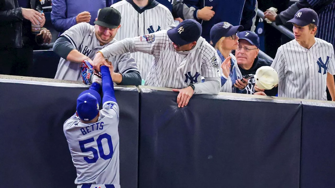 Sources: Yankees fans who interfered with Mookie Betts banned from World Series Game 5