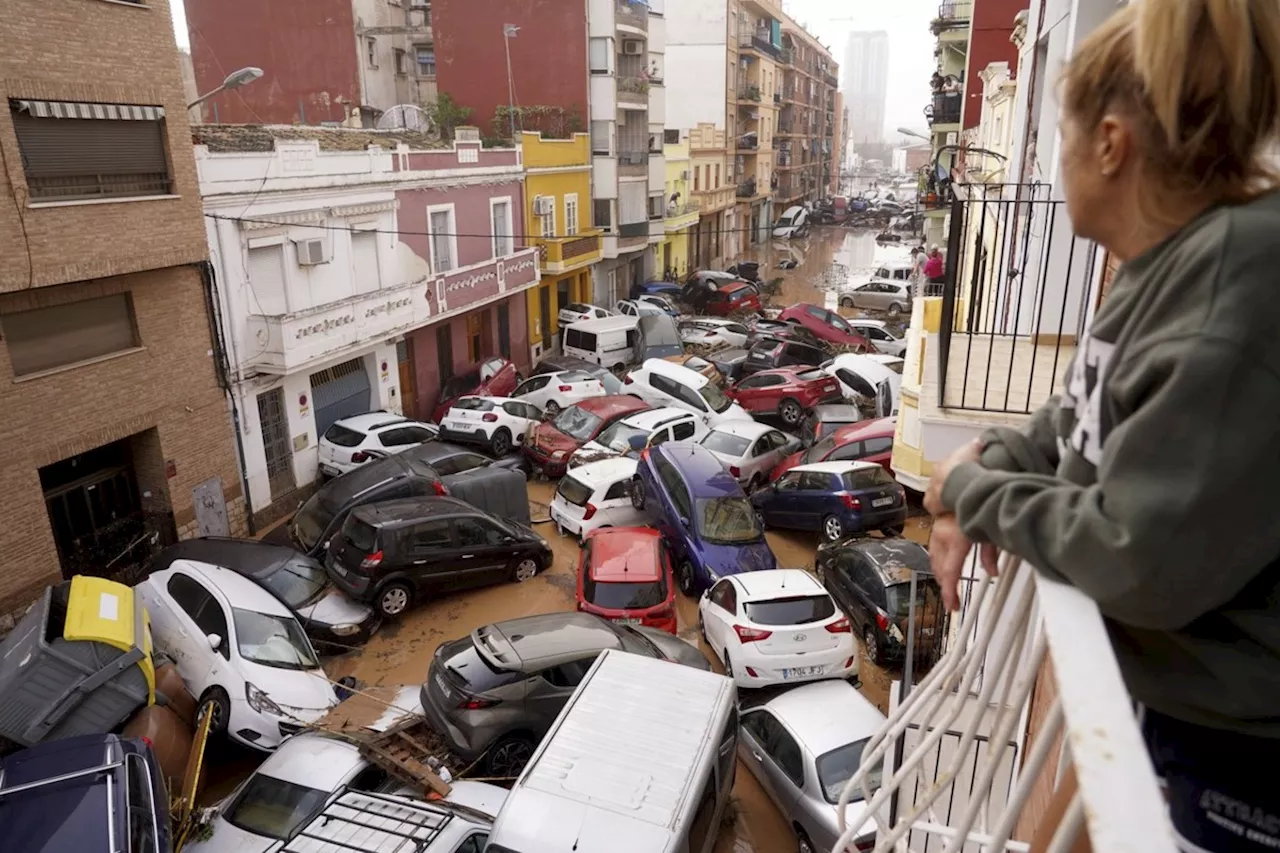 At least 64 people die in devastating flash floods in eastern Spain, officials say