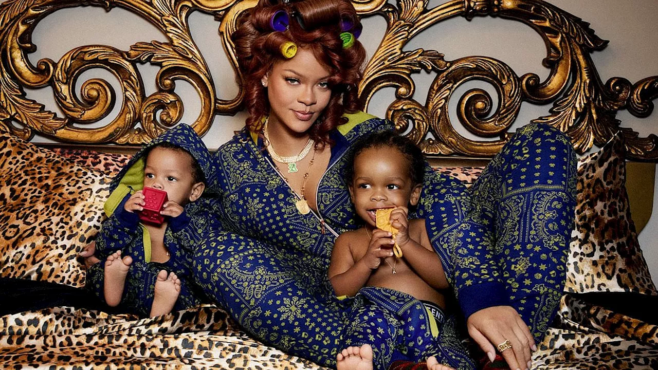 Rihanna cuddles sons RZA, 2, and Riot, 14 months, in adorable rare family snaps to plug Savage X...