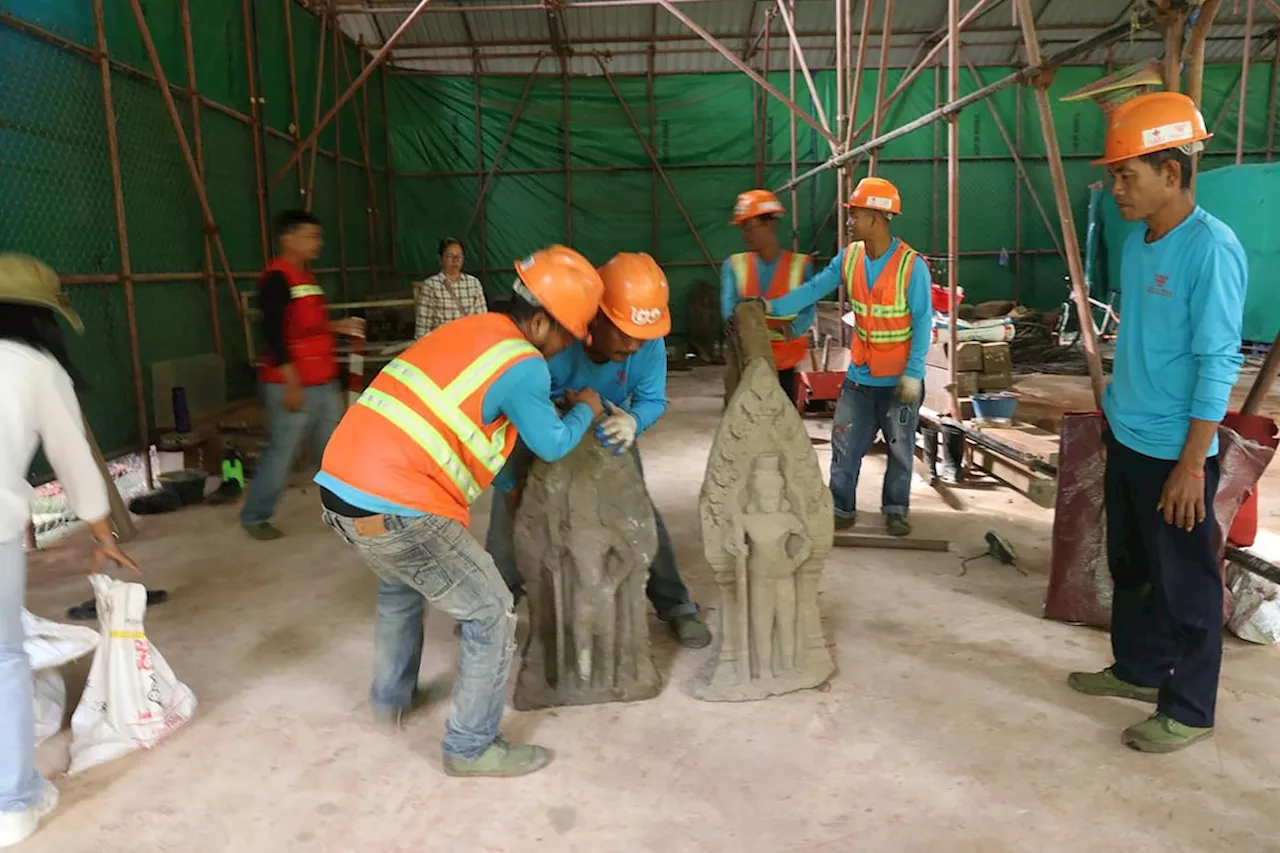 Cambodian archeologists discover centuries-old sandstone statues at Angkor UNESCO site