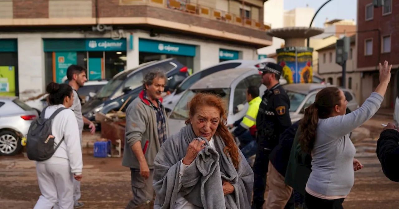 ‘The whole of Spain cries with you’: At least 95 dead and many missing as flash floods hit Valencia region