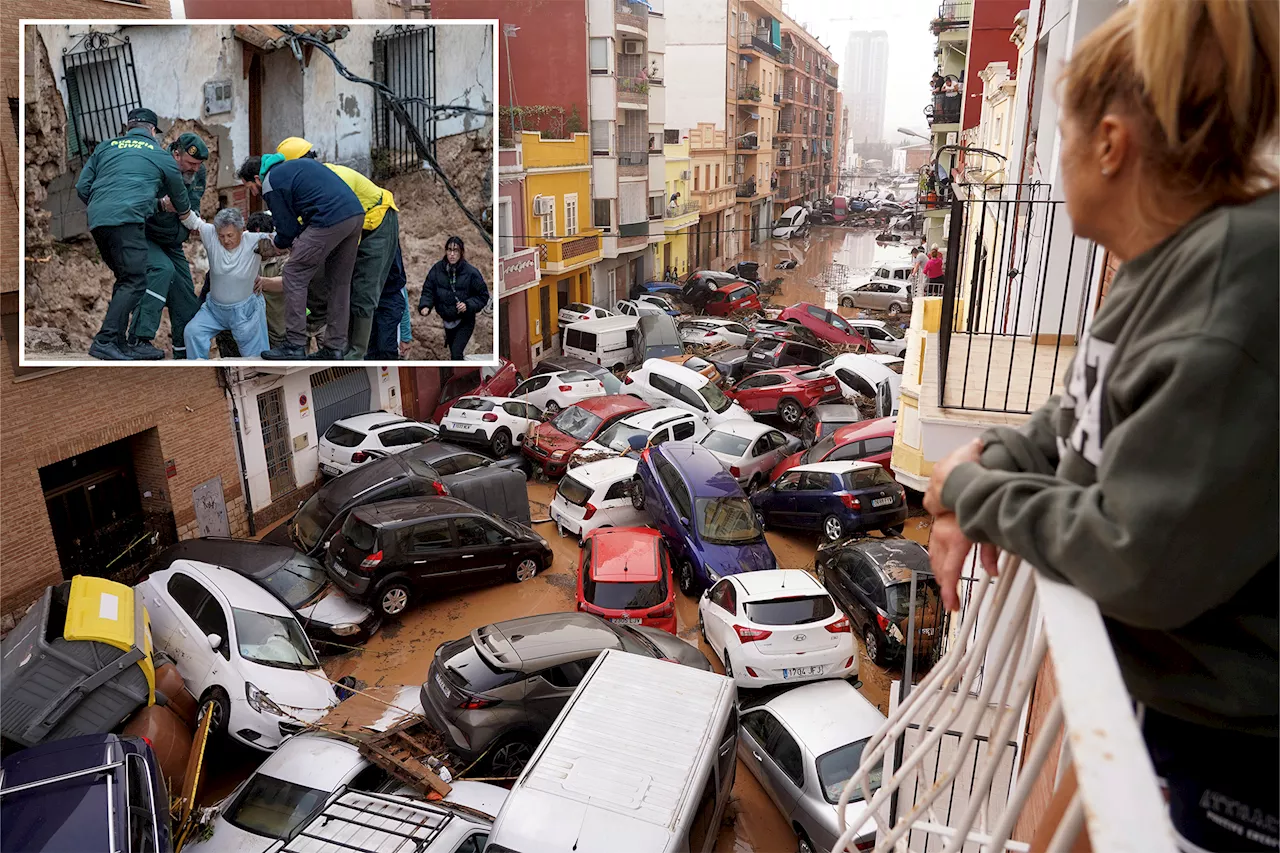 At least 51 people have died in flash flooding in Spain’s Valencia