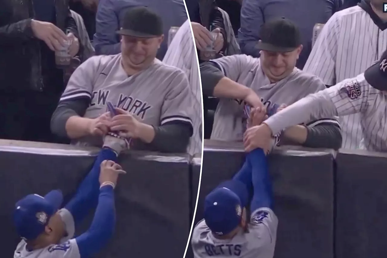 Yankees fans claw at Mookie Betts in ugly interference scene