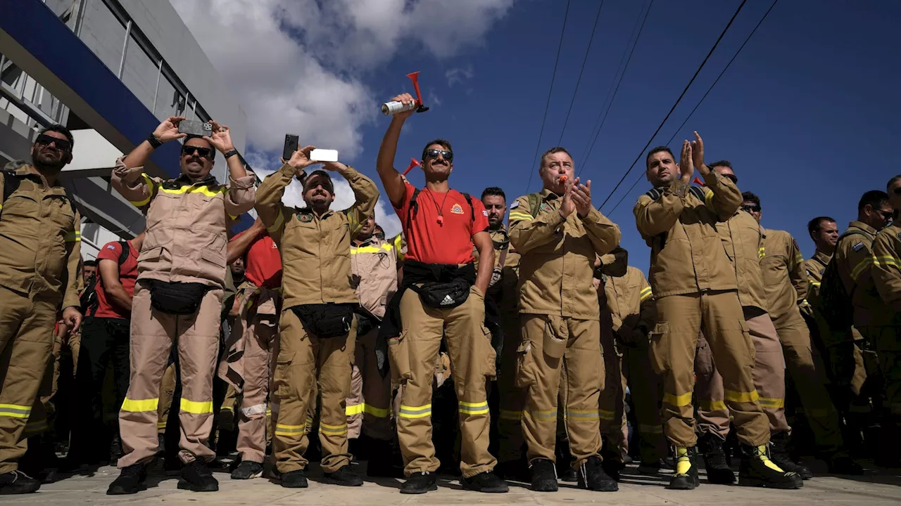 As summers get hotter, Greece's seasonal firefighters protest for permanent jobs