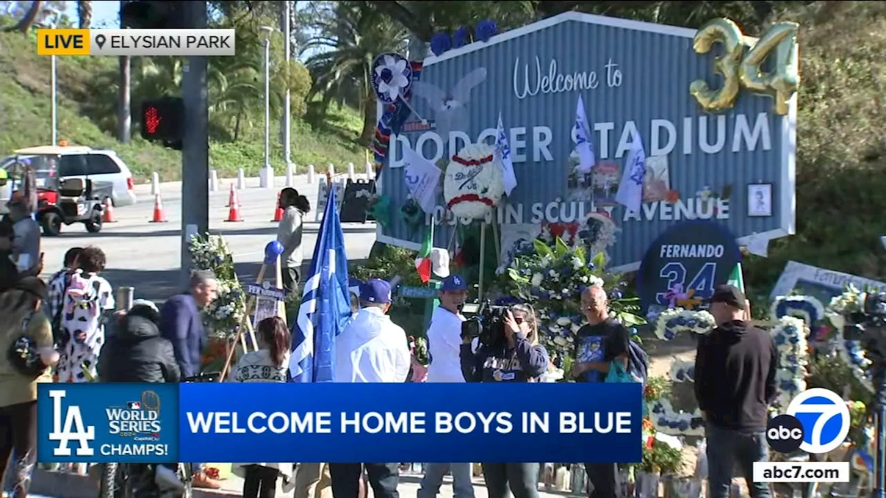 Fans swarm players' vehicles outside Dodger Stadium after World Series champs return to LA