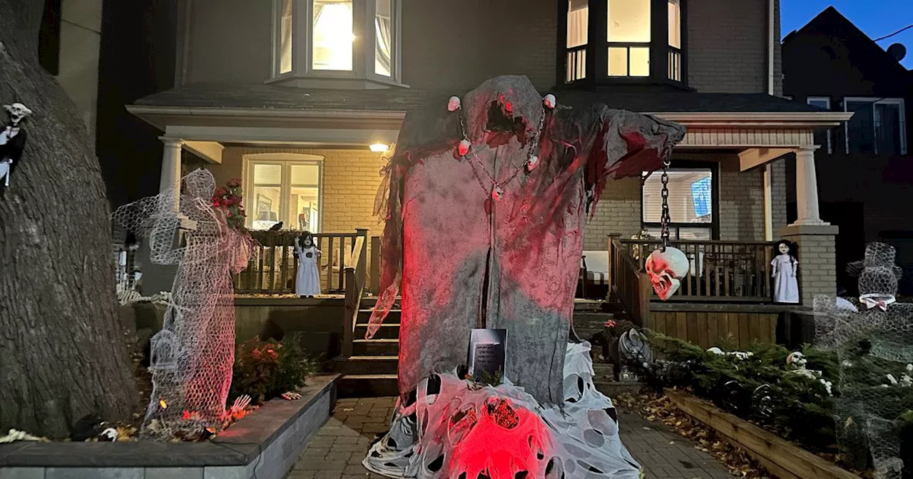 Toronto neighbours build ghostly marriage proposal for Halloween