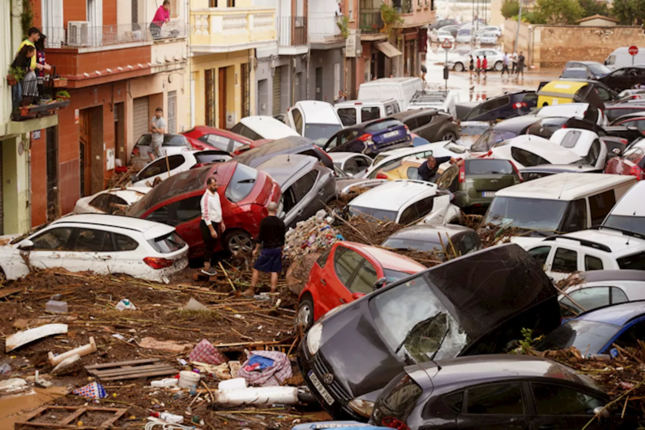 Spain searches for bodies after flood of the century claims at least 95 lives | Alberto Saiz & Joseph Wilson