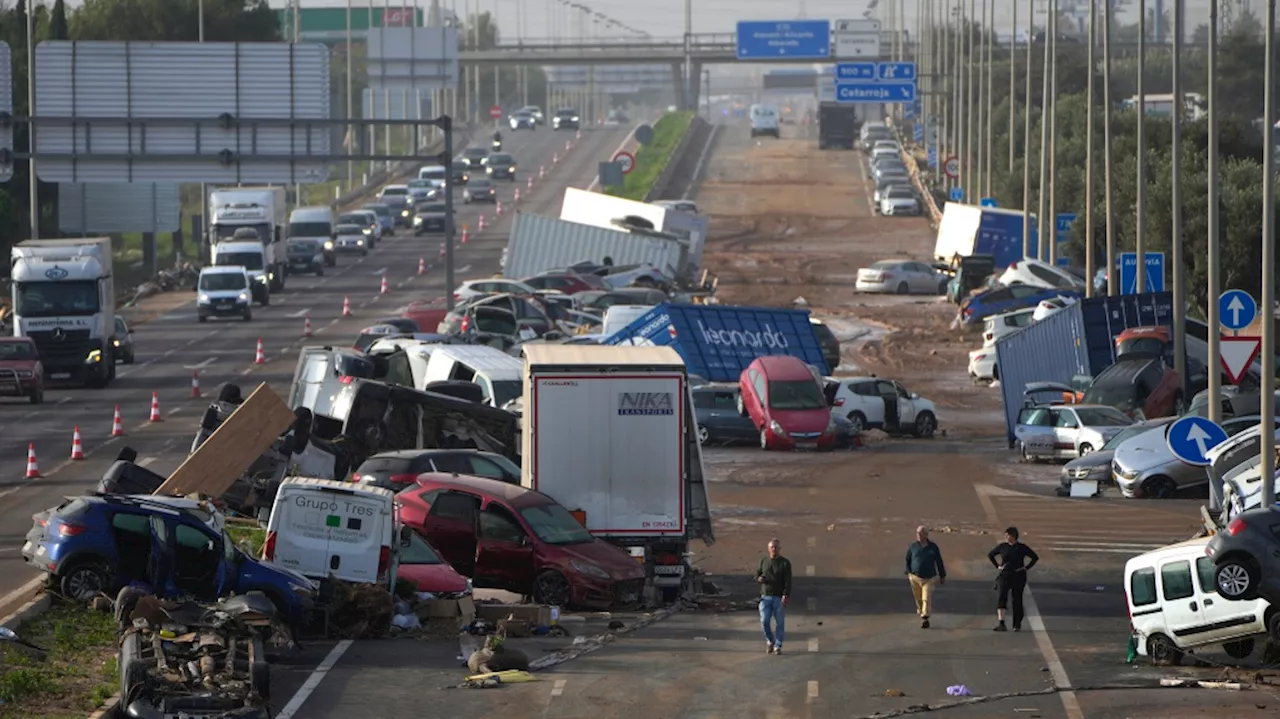 Spain searches for bodies after flood of the century claims at least 140 lives