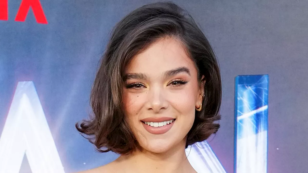 Hailee Steinfeld makes jaws drop in striking gold breastplate gown at Netflix's Arcane premiere in...