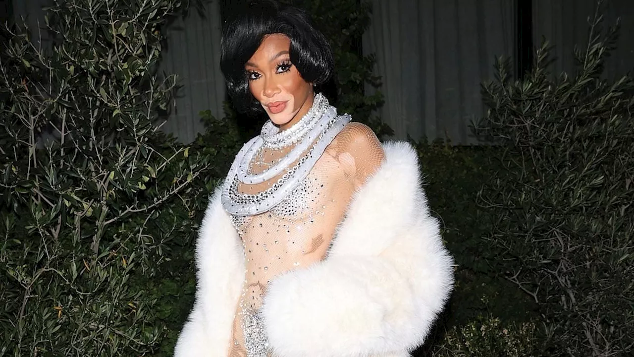 Winnie Harlow nearly bares all in skintight sheer crystal catsuit as she pays tribute to Diana Ross'...