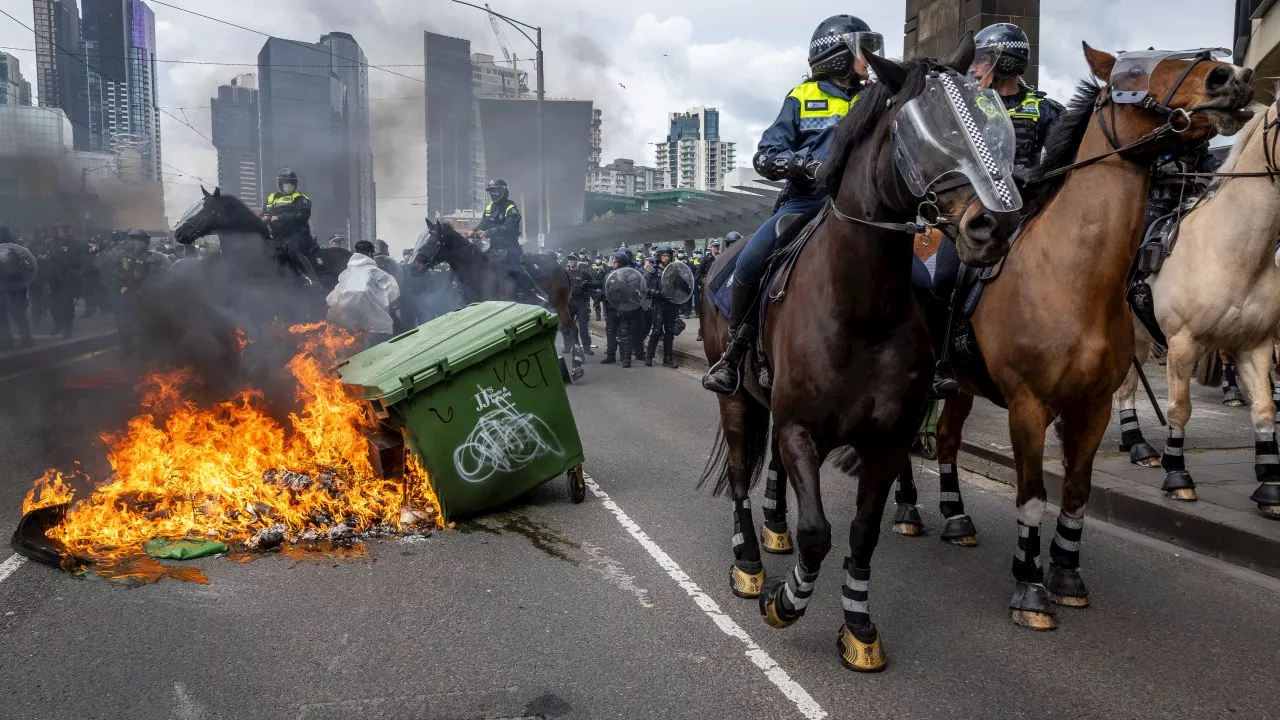 Nazi salute allegedly performed at Melbourne rally as cops hunt more protesters