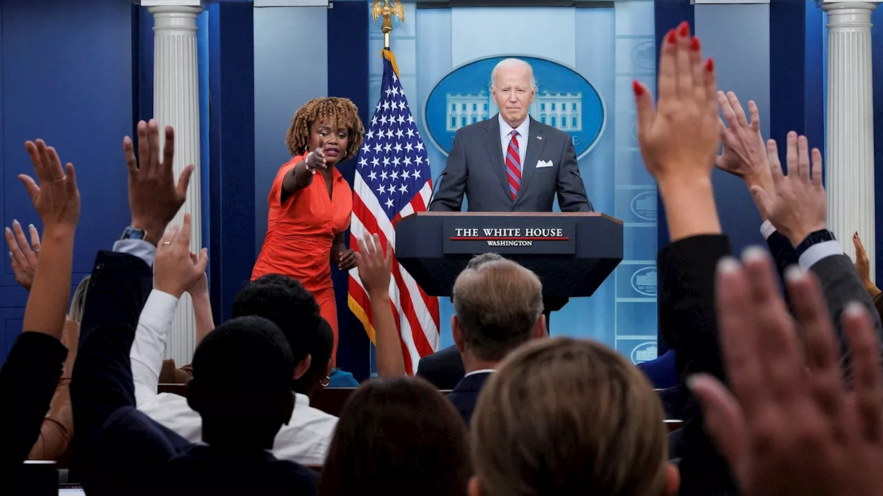 Biden takes a victory lap on economy in surprise visit to White House briefing room