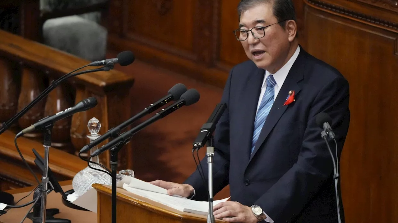 Japan's new leader expresses regret for governing party slush fund scandal, vows stronger defense