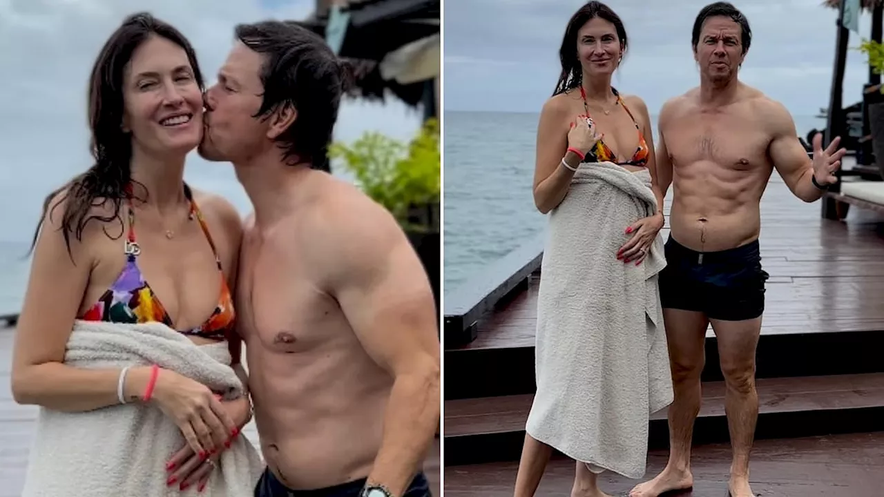 Mark Wahlberg, 53, shows off toned body and kisses wife