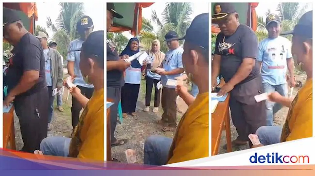 Viral Bagi-bagi Uang Rp 100 Ribu ke Warga Berbaju Paslon di Lampung Tengah