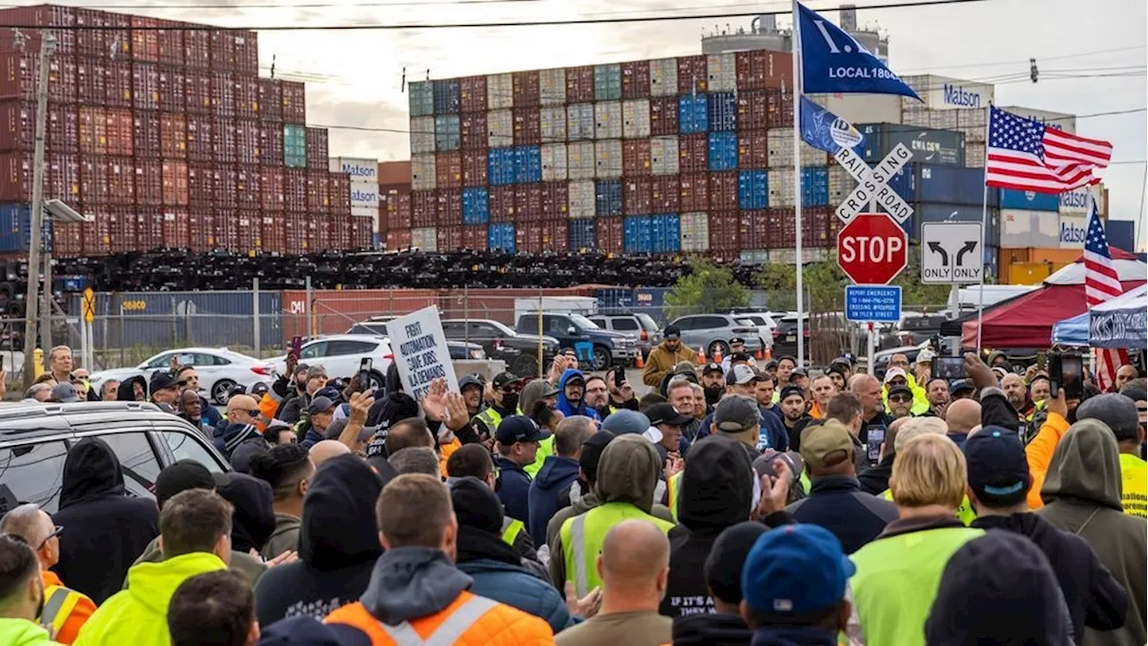 Source: Dockworkers' union to suspend strike to allow time to negotiate new contract