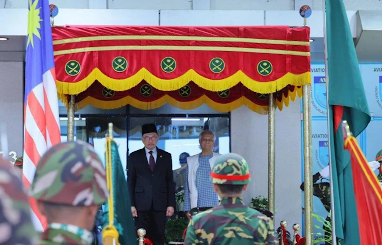 Anwar arrives in Bangladesh, welcomed by guard of honour