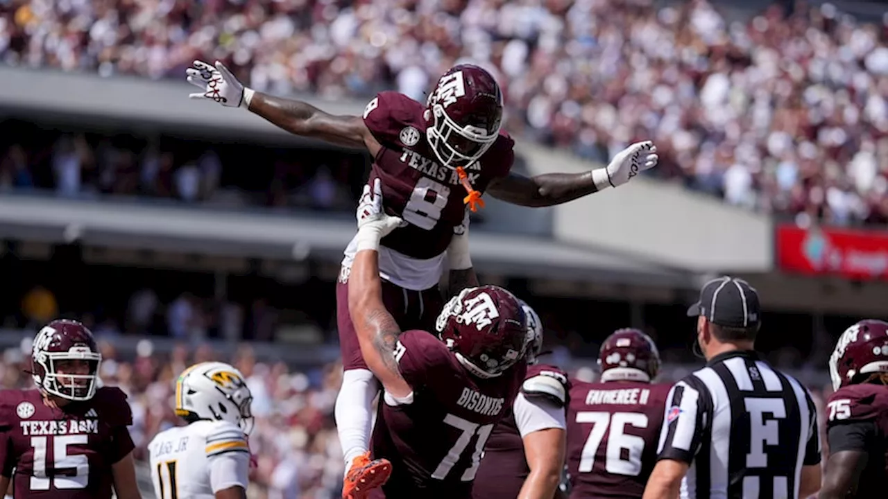 Le'Veon Moss scores 3 TDs as Texas A&M routs Missouri